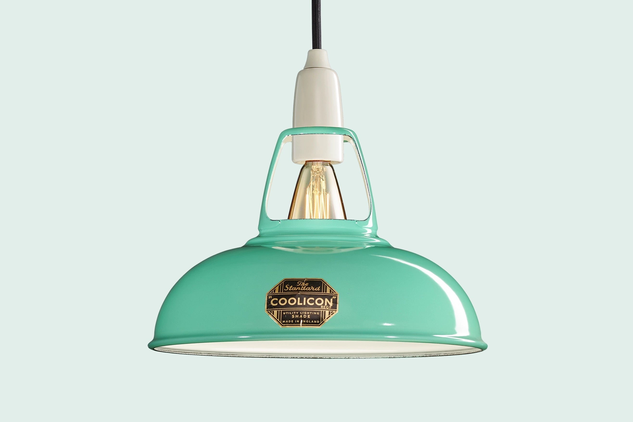 Fresh Teal Coolicon lampshade with a Porcelain pendant set over a light teal background