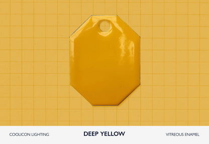 A vitreous enamel colour sample of the colour Deep Yellow from Coolicon Lighting